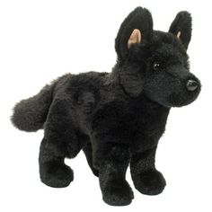 a black dog stuffed animal on a white background