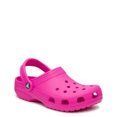 Whether youre gardening in the backyard, strolling down the boardwalk, or relaxing at home, youll love the comfort of these unisex juice (hot pink) Classic clogs from Crocs. Made of lightweight, durable Croslite material in a molded design for long-term use, these easy to clean clogs have a pivoting heel strap for a perfect fit. Iconic Crocs Comfort system provides lightweight feel, flexibility, and 360-degree comfort. The ventilation holes on the upper allow to attach Jibbitz charms to personal Crocs Colors, Hot Pink Crocs, Crocs Aesthetic, Crocs Pink, Pink Crocs, Shoe Wishlist, Shoe Company, Birthday List, Boots And Sneakers