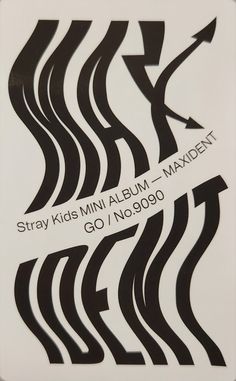 a white and black sign that says stray kids mini album - maident on it