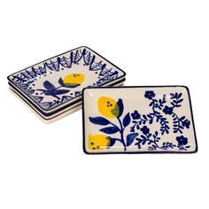 two blue and white plates with yellow flowers