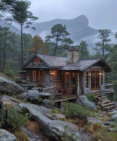 a log cabin sits on top of a rocky hill in front of trees and mountains