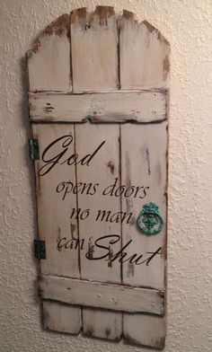 an old door with a quote on it that says god opens doors, no man can't shut