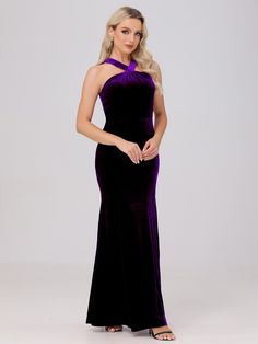 a woman in a long purple dress