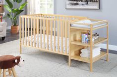 a baby crib in the corner of a room