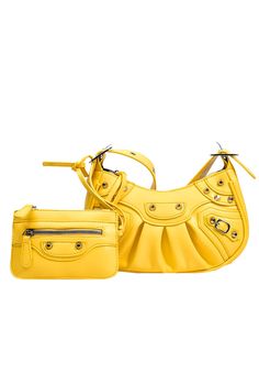 two yellow purses sitting next to each other