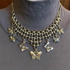 In Many Ancient Cultures, Butterflies Were Believed To Be Symbolic Of The Transformation And Rebirth Of The Soul. In Ancient Greek Mythology, The Goddess Psyche, Who Represented The Soul, Was Frequently Depicted With Butterfly Wings. In Ancient Egyptian Mythology, Butterflies Symbolized The Soul’s Journey Through The Afterlife. Whether You Love The Symbolism Of Butterflies Throughout The Ages, Or You Simply Want A Necklace That Is A Fierce Gothic Piece But Still Has Classically Feminine Touches, Silver Butterfly Necklace With Metal Chain, Silver Butterfly Necklace With Chain, Metal Butterfly Necklace For Parties, Metal Butterfly Necklace With Adjustable Chain, Metal Butterfly Charm Necklace For Party, Butterfly Shaped Metal Necklaces For Parties, Butterfly Charm Metal Necklace For Party, Silver Steampunk Jewelry For Alternative Fashion, Steampunk Silver Jewelry For Alternative Fashion