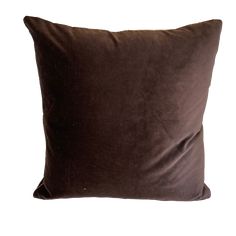 a brown pillow on a white background with no one in the photo to describe it