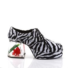 This is a listing for a new pair of 3.5” Zebra Fur Print Platform Shoes.  The heel is clear with a fake goldfish inside.  These shoes are made by Funtasma, which is the go-to brand for great costume shoes.  The style name is Pimp-02.  These would be a great addition to a 70s, Disco or Pimp themed costume. Available colors: Black Patent, White Patent, Zebra Print Available sizes: US men's sizes 8/9, 10/11, 12/13 and 14.  The sizing for these shoes runs in doubles, however don't be scared off by t Disco Shoes, Alternative Shoes, Single Sole Heels, Festival Shoes, Punk Boots, Pleaser Shoes, Gogo Boots, Costume Shoes, Cosplay Shoes