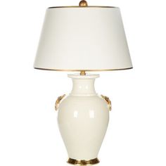 a white table lamp with a gold trim around the base