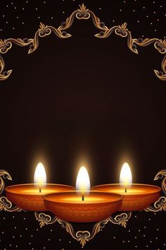 three lit candles in front of a black background with gold trimmings and an ornate frame