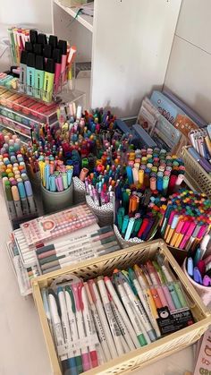 many different types of crayons are on display in this room, including pens and pencils