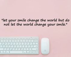 a keyboard and mouse on a pink background with the words let your smile change the world but do not let the world change your smile