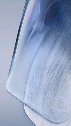 the back side of an iphone 11 pro with its camera facing up, and it's glass cover