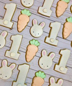 decorated cookies with numbers and bunnies for first birthday