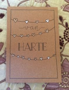 a brown card with hearts on it that says i am harte