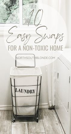 a laundry basket sitting in front of a window with the words easy swaps for a non - toxic home