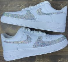 The famous Nike Air Force 1 but add a little bit of spice! These beautiful sneakers are blinged out on the Nike swooshes as well as the outside toe box. Rhinestones are hand placed on both the insides and outsides of the shoes *Depending on what color you choose for the rhinestones, shoes may be painted with high quality leather paint underneath the rhinestones to match * Many different sizes to choose from * Made to order * Sizes are in womens *Authentic Nikes bought from Nike store *Tested and Zapatillas Nike Air Force, Quinceanera Shoes, Bling Nike Shoes, Swarovski Nike, Event Shoes, Bedazzled Shoes, Boty Nike, Custom Air Force 1, Rhinestone Shoes