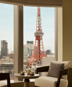 a room with a view of the eiffel tower