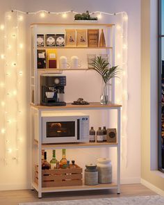 a microwave oven sitting on top of a wooden shelf