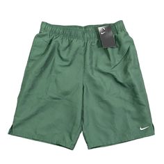 Nike Men's Standard Solid Lap 9" Volley Short Swim Trunk Short Green Swim Trunks For Water Sports, Green Nylon Short Swim Trunks, Green Swim Trunks With Built-in Shorts For Water Sports, Nike Swim Shorts, Green Moisture-wicking Short Swim Trunks, Green Swim Trunks With Built-in Shorts For Swimming, Nike Swimsuit, Pool Outfits, Nike Swim