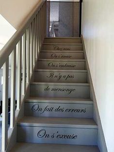 the stairs are painted with french phrases