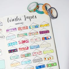 an open planner with washi tapes on it