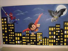 this is an image of a batman and superman wall mural