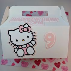 a hello kitty birthday card in a box