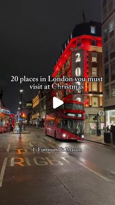 a red double decker bus driving down a street next to tall buildings with the words 20 places in london you must visit at christmas