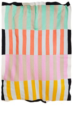 a multicolored striped blanket on a white background