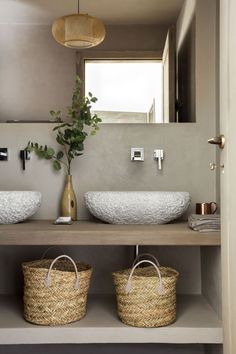 an image of a bathroom with two sinks and baskets on the counter top, along with text that reads do it little green b