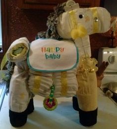 an elephant made out of diapers sitting on top of a counter