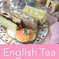 english tea sandwiches on a plate with pink and white flowers in the foreground text reads english tea sandwiches