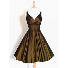 This glamorous dress is made from a rich cocoa brown taffeta fabric, perfect for a wedding or party. The Sweetheart neckline and 'Low- V' back make for a classic 1950's evening look and the full skirt can be emphasized with a petticoat (as pictured - petticoat not included) for extra glamour or left to fall naturally.  The full skirt is photographed with a petticoat, please note this petticoat is not included in the sale. This dress is READY TO SHIP NOW. This dress is ready made and available of Dig For Victory, Coffee Brown Color, Glamorous Dress, Robes Glamour, Christmas Dresses, Taffeta Fabric, Glamorous Dresses, Cocoa Brown, Vintage Style Dresses