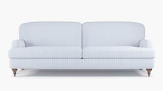 a blue and white striped couch against a white background