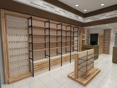 an empty store with wooden shelves and glasses