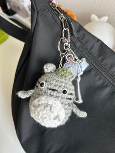 a crocheted keychain with a cartoon character on it