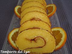 slices of orange and cinnamon roll on a glass plate with the words emporo da lata