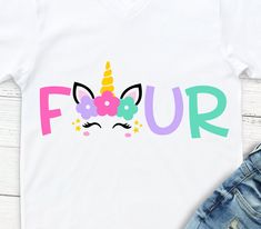 a t - shirt that says four with a unicorn's face and stars on it