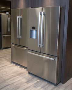 a stainless steel refrigerator and freezer combo in a kitchen