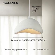 a white light hanging from the ceiling in a room with measurements for it's width