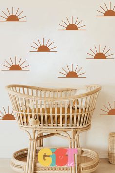 the sun wall decals are shown in an orange and white room with wicker furniture