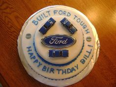 a birthday cake with the words built ford tough happy birthday bill on it's side