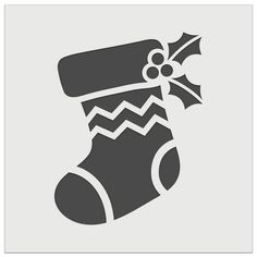 a christmas stocking icon with a holly berry on it's side and a bow at the top