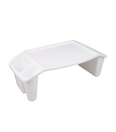 a white plastic tray with two compartments on it