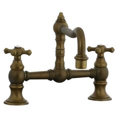 an antique style faucet with two handles