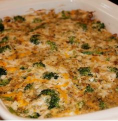 a casserole dish filled with broccoli and cheese