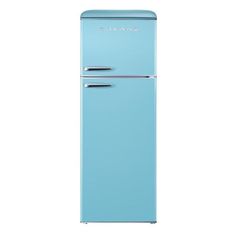 a blue refrigerator freezer sitting on top of a white floor next to a wall