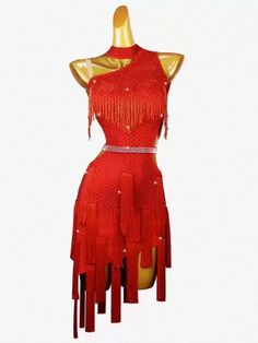 a mannequin wearing a red dress with fringes