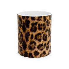 a leopard print coffee mug on a white background, with the pattern of an animal's fur